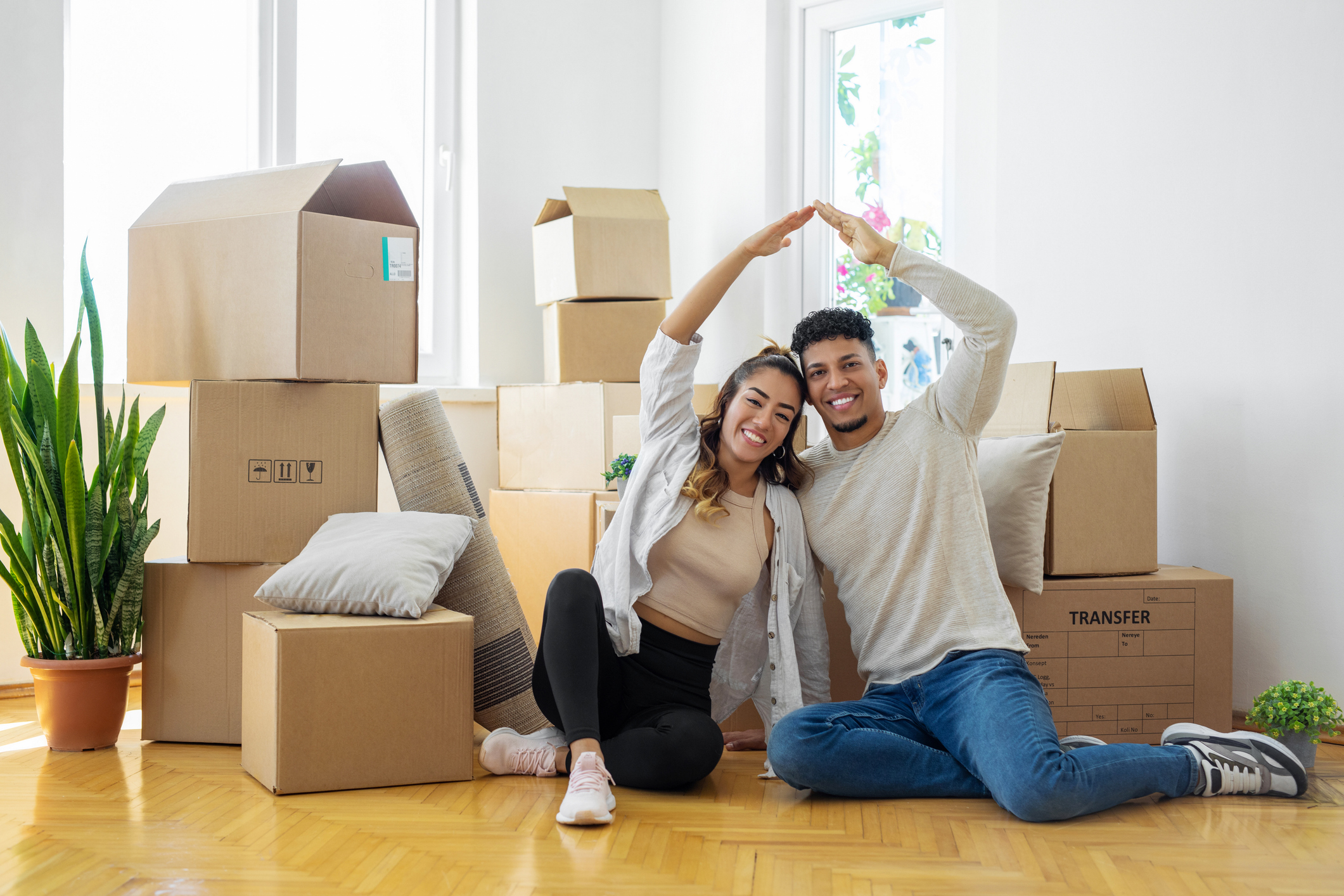 Young couple moving into a rental suite